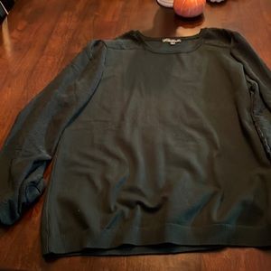 Green sweater with detailed sleeves